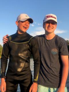 2 teenage boys smiling