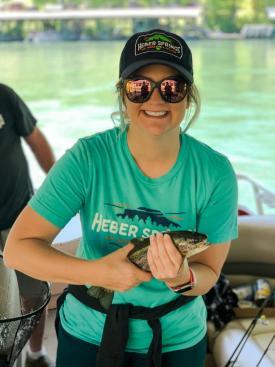 Woman holding fish